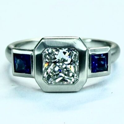 RING A-1015 -  Diamond in Platinum and Blue Sapphires